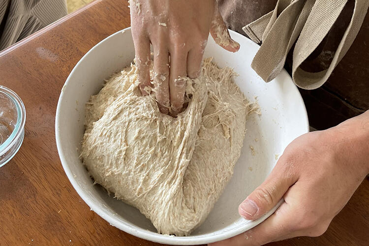 Demonstrating making sourdough bread