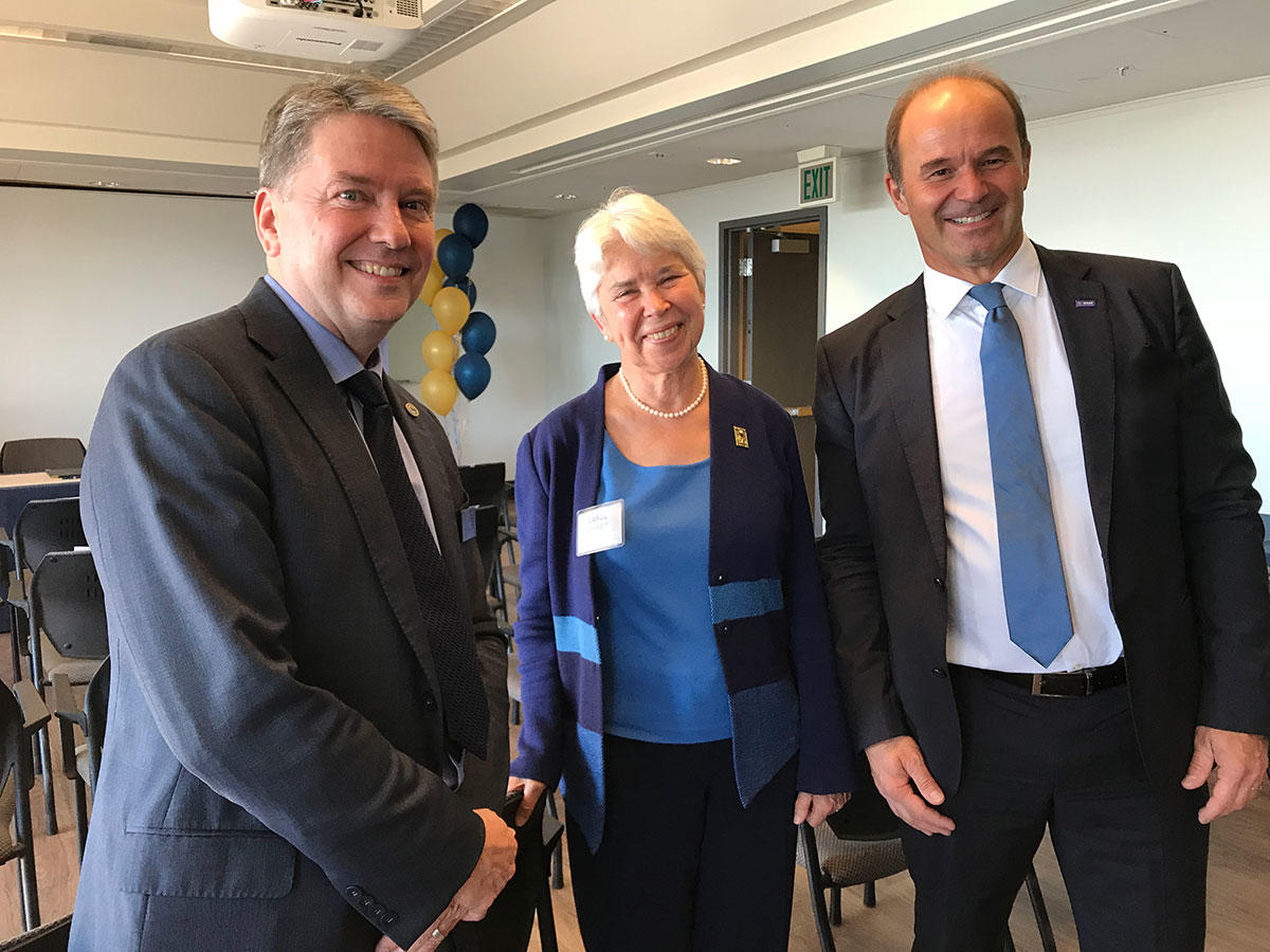 Douglas Clark, Carol Christ & Martin Brudermuller at the signing event