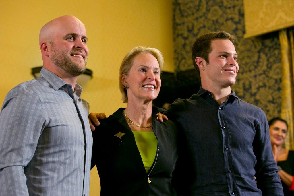 Dr. Arnold with her sons James Bailey, left, and Joseph Lange at Caltech last fall. Credit Damian Dovarganes/Associated Press