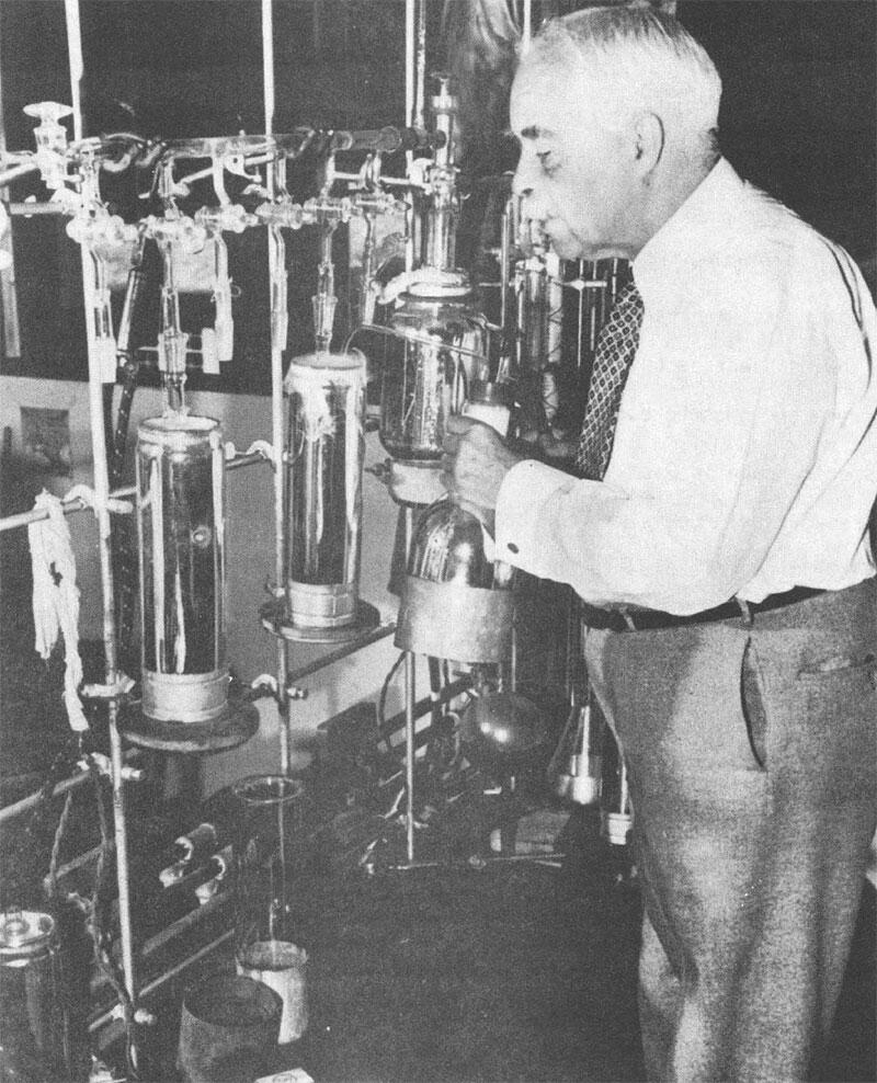 Lewis at vacuum line in the laboratory on the third floor of Gilman Hall at the time in the 1940s when he was conducting research on color and the Triplet State.