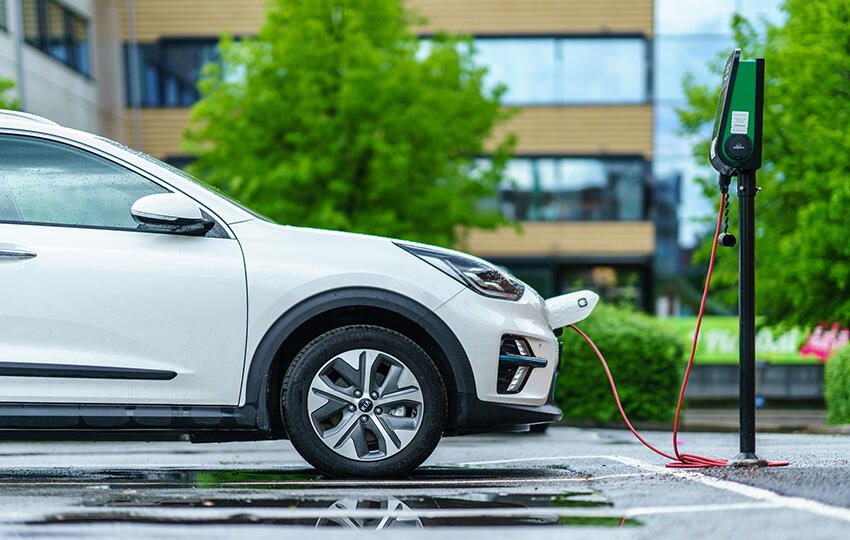 Electric car charging. Photo by Nrqemi/iStock.