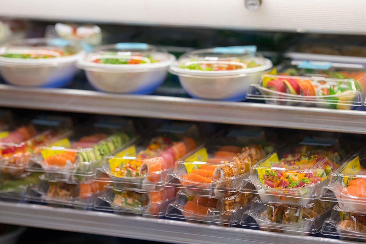 packaged food sits on a shelf in a store