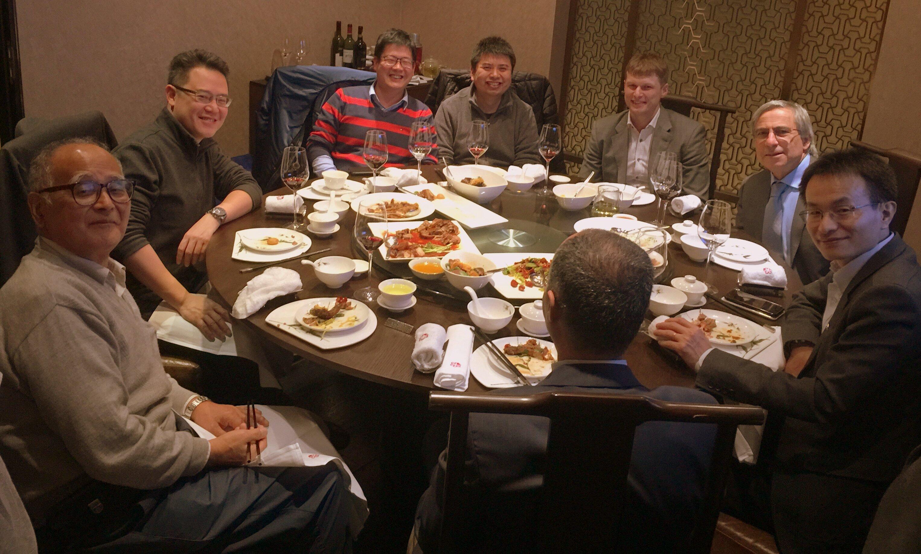 Group of scientists at meeting in Shaghai