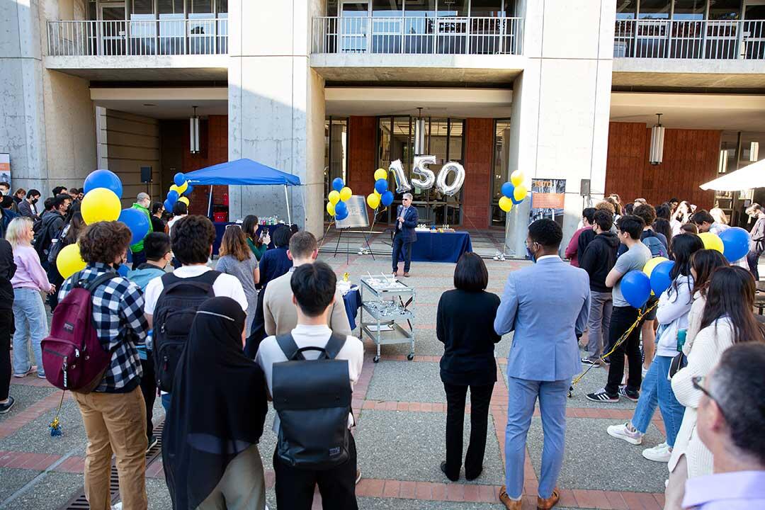 Douglas Clark opens the ceremony on the plaza for the 150th anniversary