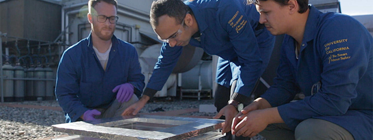 Markus Kalmutzki, Farhad Fathieh and Eugene Kapustin set up the water harvester. (Stephen McNally photo)