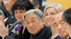 Japanese Emperor Akihito with Doudna, Charpentier. Courtesy Getty Images.