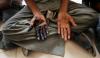 photo of hands by Adnan Abidi/Reuters
