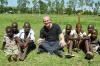 Jay Keasling with children in a village outside Nairobi, Kenya. (Photo by Gabrielle Tenenbaumn)