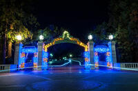 Sather Gate lit up during winter time