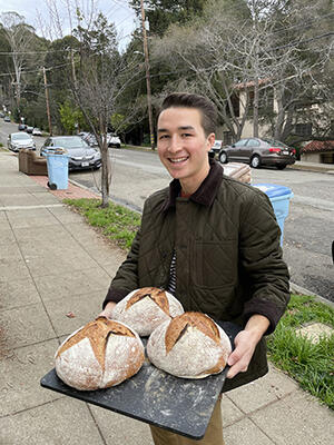 Brendan Huang shows of finished bread