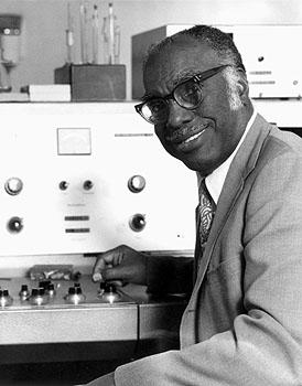 A scientist with laboratory equipment