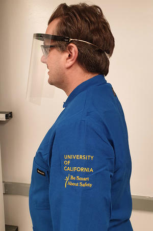 Michael Zuerch wears a PPE faceshield